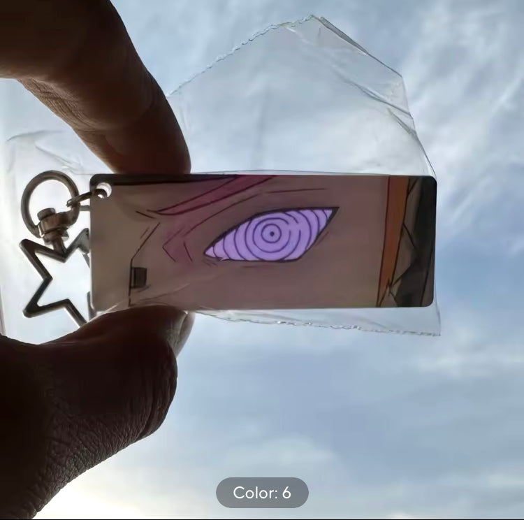 LLavero de Naruto, colgante de acrílico con ojos brillantes